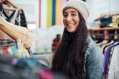 Buy stock photo Cropped portrait of an attractive teenage girl standing alone and shopping in the city during the day