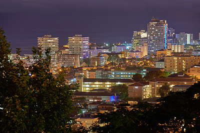 Buy stock photo City lights of Cape Town at night from above with copy space. Panoramic coastal urban landscape at sunset. High angle view from Signal Hill, South Africa of the cityscape and a beautiful horizon