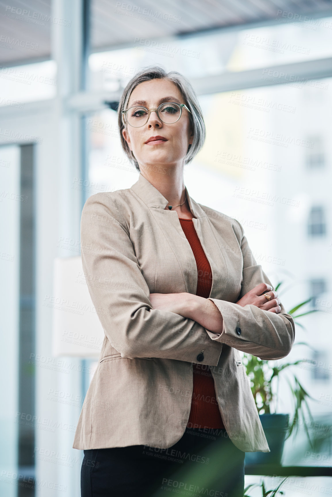 Buy stock photo Realtor, proud or portrait of businesswoman with arms crossed in rental property, agency or development. Developer, mature or real estate agent in office with confidence for advice on mortgage loan