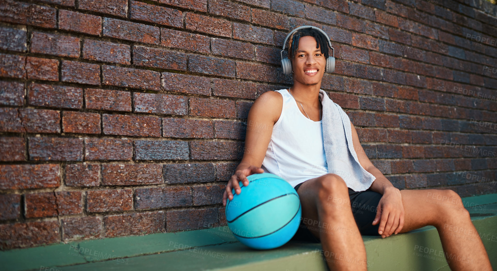 Buy stock photo Man, sports and ball in portrait as basketball player or athlete for challenge, cardio or training. Male person, headphones and outdoor for competition, match or game in physical activity or exercise