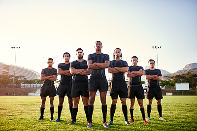 Buy stock photo Full length portrait of a diverse group of sportsmen standing together before playing rugby during the day