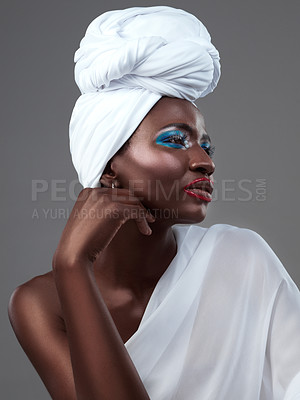 Buy stock photo Profile, wrap and black woman with makeup, fashion and confidence in studio on grey background. Face, beauty or proud African model with traditional turban, eyeshadow cosmetics or creative outfit