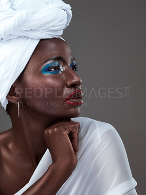 Buy stock photo Profile, face and black woman with makeup, wrap or confidence in studio on grey background. Beauty glow, fashion or proud African model with traditional turban, eyeshadow cosmetics or creative outfit