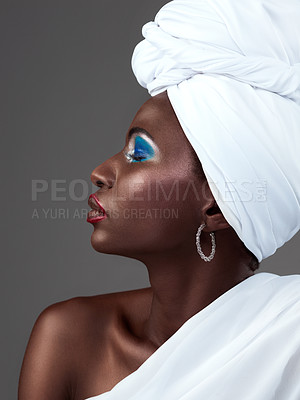 Buy stock photo African, woman and creative makeup in fashion and pride in beauty of indigenous culture. Studio, profile and turban with color eyeshadow, cosmetics on skin and traditional tribal aesthetic of queen