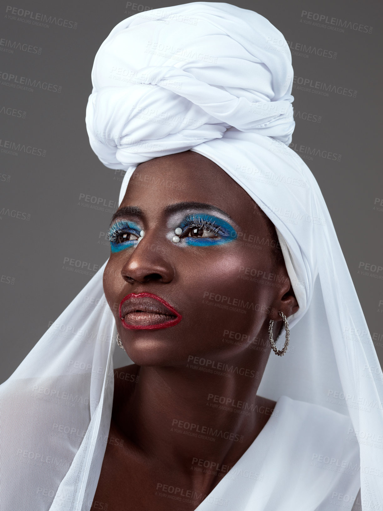 Buy stock photo Makeup, face or black woman in studio with wrap, turban or ideas for African culture on grey background. Beauty glow, fashion and proud model with traditional style, eyeshadow shine or art decor