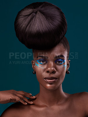 Buy stock photo Portrait, hair and makeup with an african woman in studio on a blue background for beauty or cosmetics. Face, haircare and fashion with an attractive young female model at the salon for trendy style