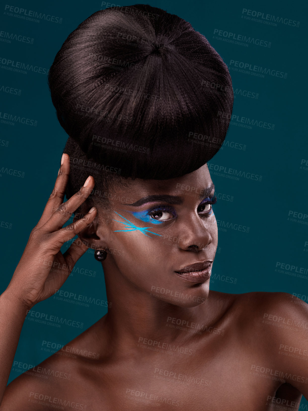 Buy stock photo Portrait, beauty and hair with an african woman in studio on a blue background for makeup or cosmetics. Face, haircare and fashion with an attractive young female model at the salon for trendy style