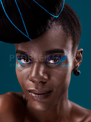 Buy stock photo Portrait, makeup and eye shadow with a black woman in studio on a blue background for beauty. Face, hair and cosmetics with an attractive young female model at the salon for fashion or styling