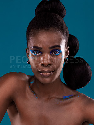 Buy stock photo Portrait, makeup and hair care with a black woman in studio on a blue background for natural cosmetics. Face, beauty and contemporary fashion with a beautiful female model posing for trendy style