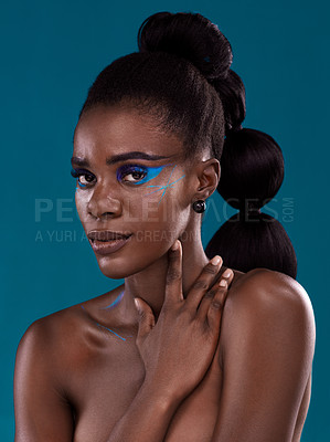 Buy stock photo Portrait, makeup and hair care with an african woman in studio on a blue background for hairstyle or cosmetics. Face, haircare and fashion with an attractive young female model posing for beauty