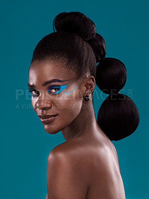 Buy stock photo Portrait, beauty and makeup with a model black woman in studio on a blue background for hair or fashion. Face, cosmetics and haircare with an attractive young female person posing for haircare