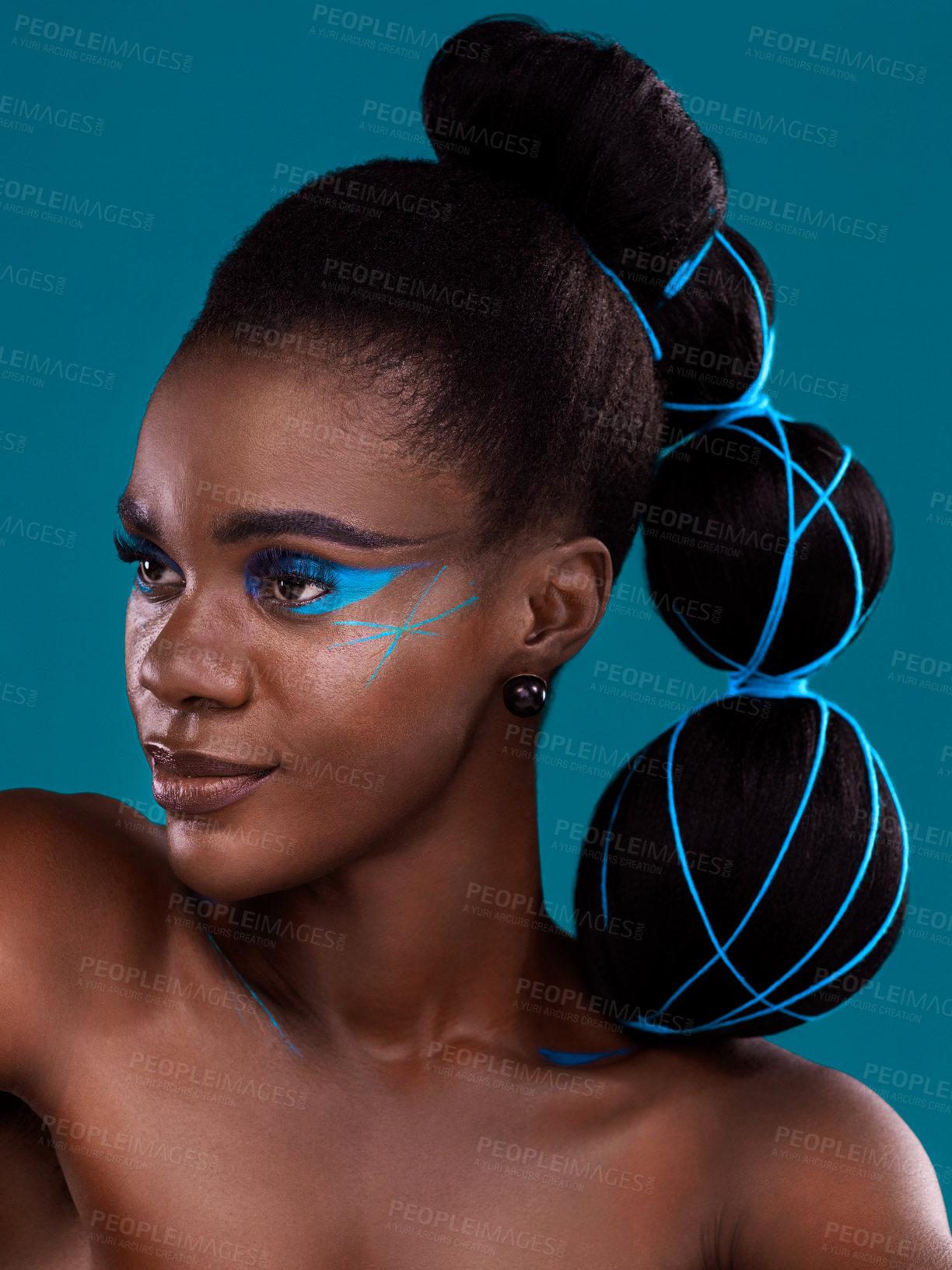 Buy stock photo Studio shot of a beautiful young woman posing against a turquoise background