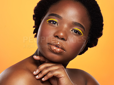 Buy stock photo Makeup, skincare and black woman with portrait, luxury and shine on yellow studio background. African person, face and model with glow, dermatology and cosmetics with creativity, artistic or grooming