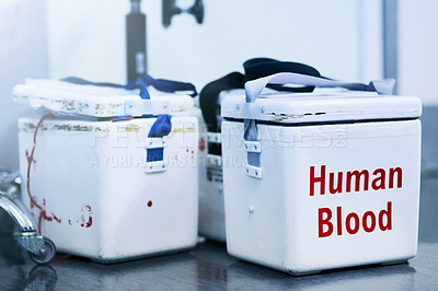 Buy stock photo Shot of boxes containing blood samples on a hospital floor