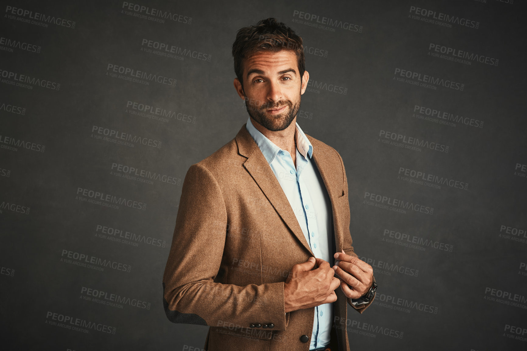 Buy stock photo Confident, man and fashion portrait in studio with stylish, trendy and elegant smart suit as Professor. Smile, male person and luxury wealth in designer outfit with pride on grey background
