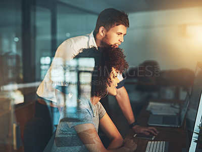Buy stock photo Cropped shot of young employees working late into the evening