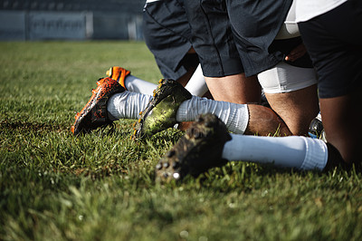 Buy stock photo Boots, rugby and training with team of people outdoor on field together for competition or challenge. Fitness, performance and sports drill with player group on grass for start of game or match