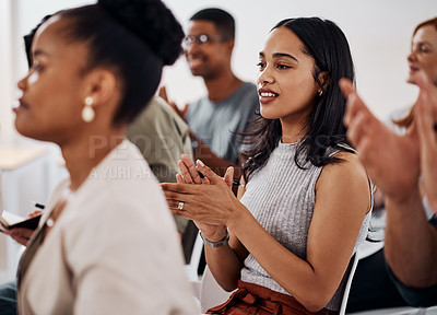 Buy stock photo Shot of a young businesswoman applauding during a conference