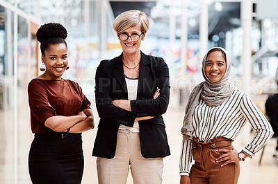 Buy stock photo Portrait of a group of businesswoman standing together in an office