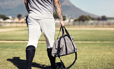 Buy stock photo Cropped shot of a man walking onto a baseball field