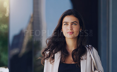 Buy stock photo Thinking, focus and business woman in city for morning, professional and commitment. Commute, modern and natural with face of female employee in urban outdoor for motivation, confident and pride