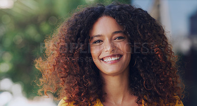 Buy stock photo Cropped shot of a beautiful young woman standing outdoors