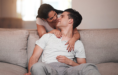 Buy stock photo Full length shot of an affectionate young couple in their living room at home
