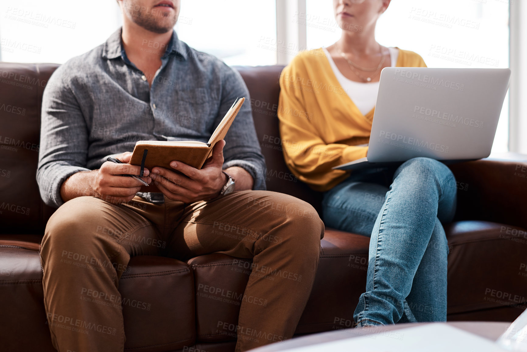 Buy stock photo Meeting, sofa business people with laptop and notebook for planning, brainstorming and discussion. Startup company, office and man and woman on computer for teamwork, collaboration and talking