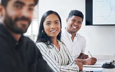 Buy stock photo Portrait of a young businesswoman having a meeting with colleagues in a modern office