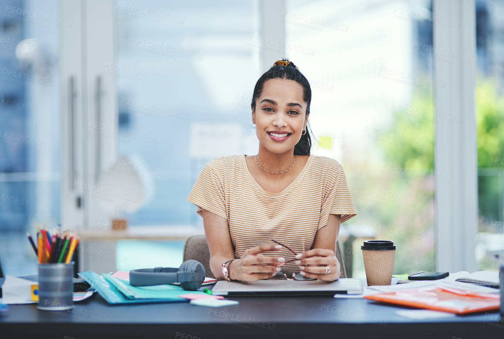 Buy stock photo Portrait of a young designer working in an office