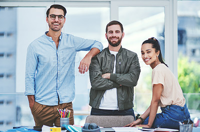 Buy stock photo Portrait of a group of young designers working together in an office