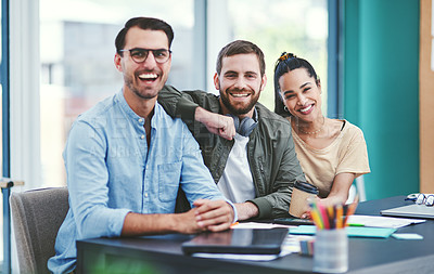 Buy stock photo Portrait of a group of young designers working together in an office