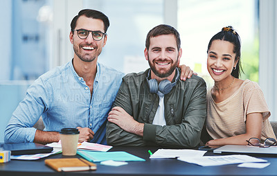 Buy stock photo Portrait of a group of young designers working together in an office