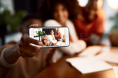 Buy stock photo Cropped shot of a group of businesspeople taking a selfie while working late