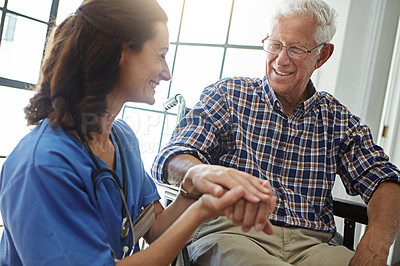 Buy stock photo Cropped shot of a female nurse talking to a senior patient in the retirement home