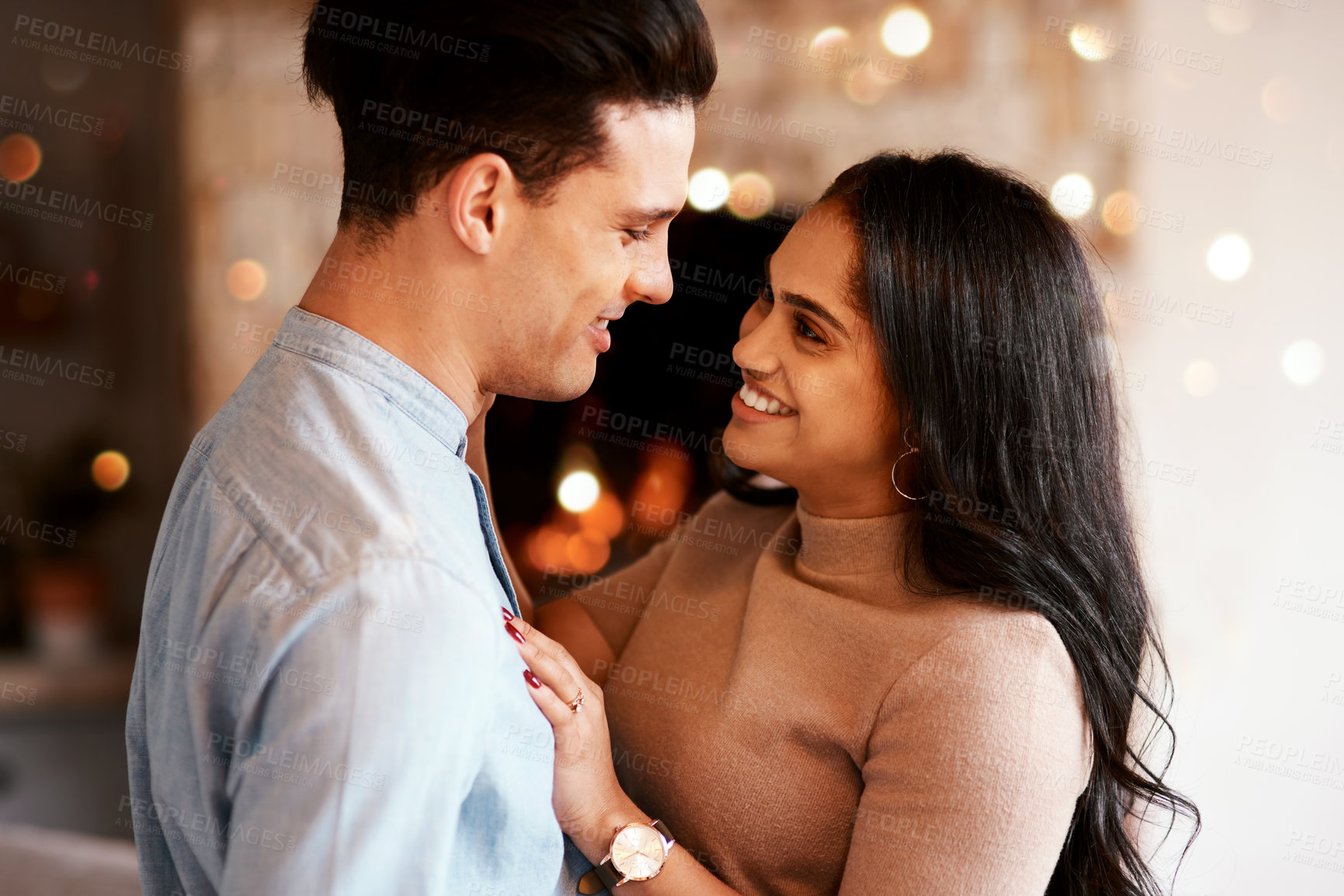 Buy stock photo Love, romance and happy couple hugging on a date for valentines day, romantic event or anniversary. Happiness, smile and interracial man and woman embracing after a dinner celebration together.