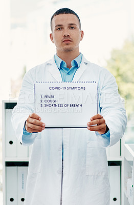 Buy stock photo Man, portrait or doctor with sign for covid symptoms, warning or awareness at laboratory. Male person, medical professional or healthcare employee with poster, page or paper for side effects on virus