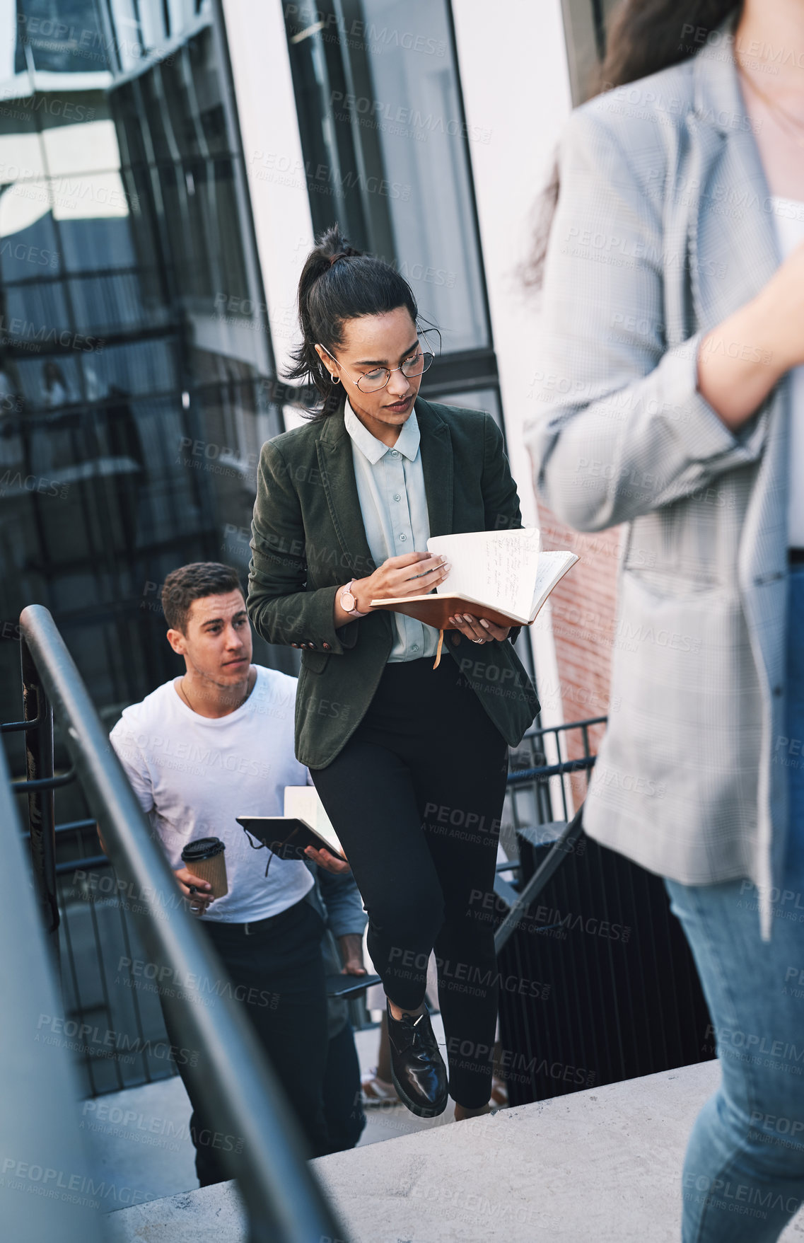 Buy stock photo Walking, notebook and business people on outdoor stairs with schedule plan, agenda and morning travel to office. Professional, man and woman on steps with notes, seminar and commute to agency meeting