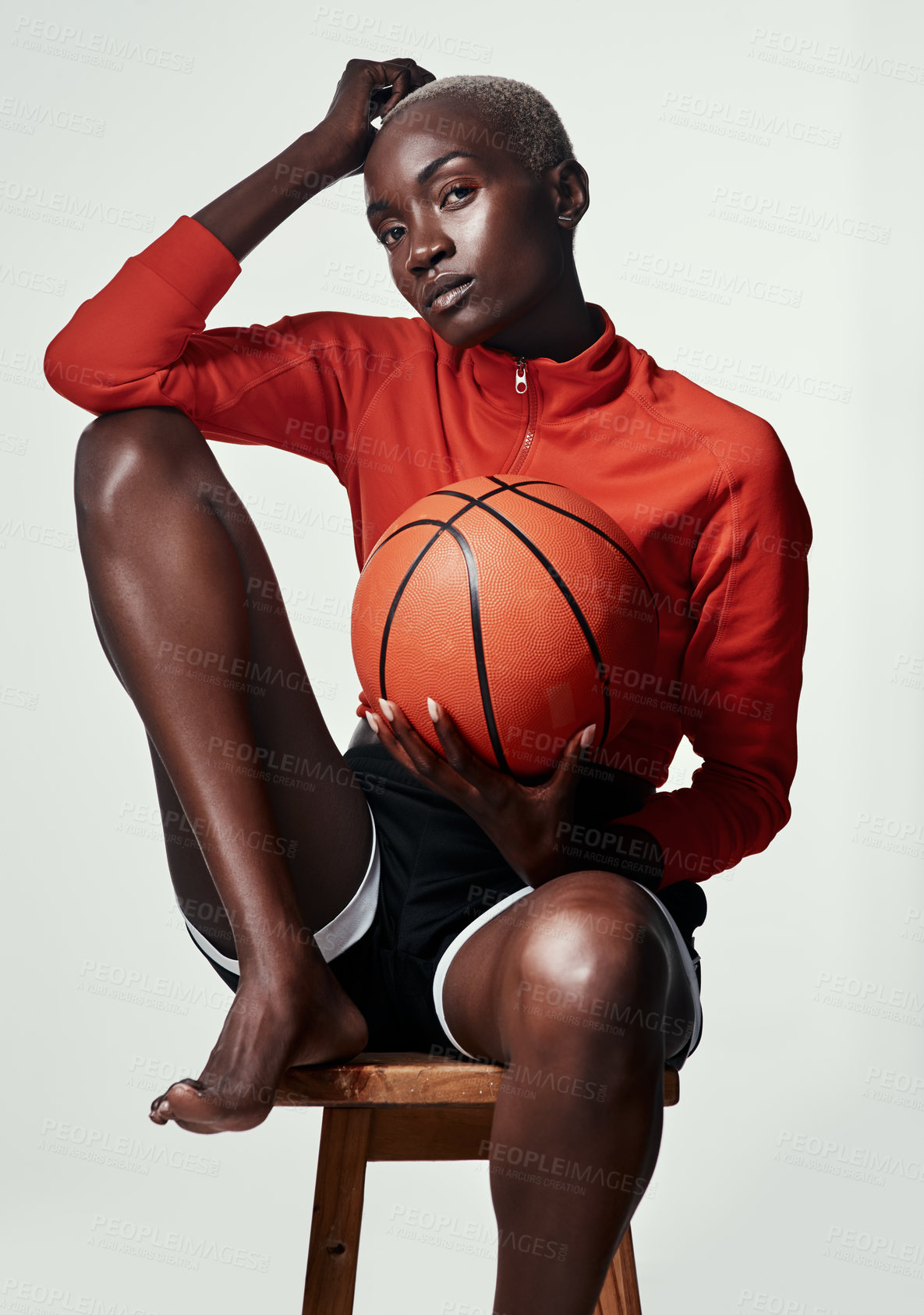 Buy stock photo African woman, basketball player and fitness in studio portrait, chair and beauty by white background. Person, athlete and ready for challenge with sports, training or competition on stool in Nigeria