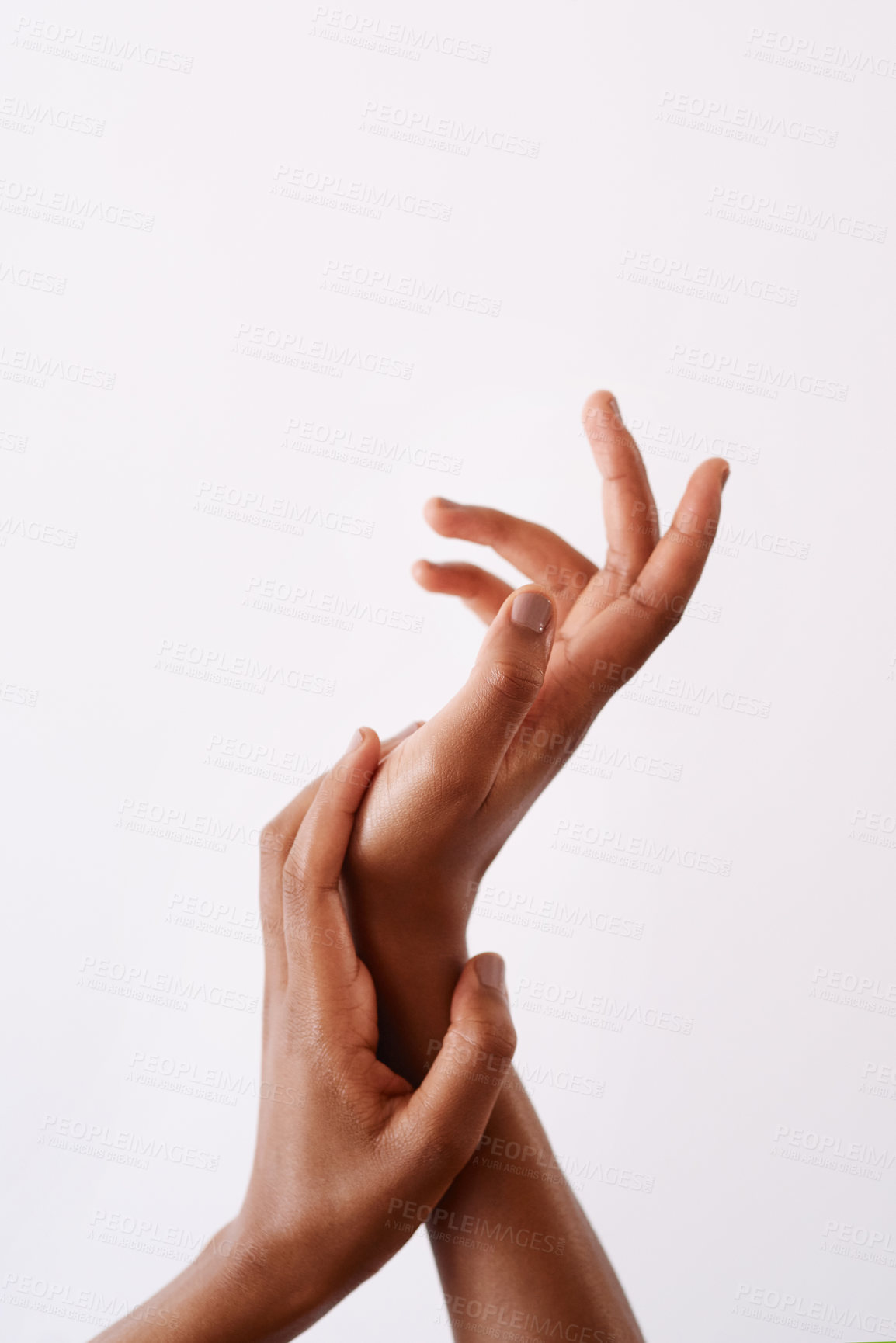 Buy stock photo Studio shot of an unrecognizable woman's hands against a white background