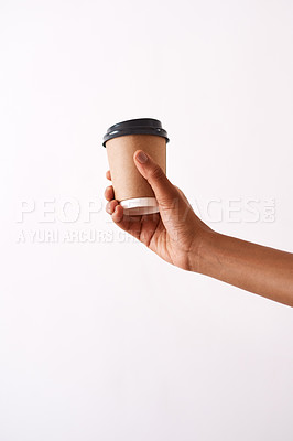 Buy stock photo Studio shot of an unrecognizable woman holding a disposable coffee cup against a white background