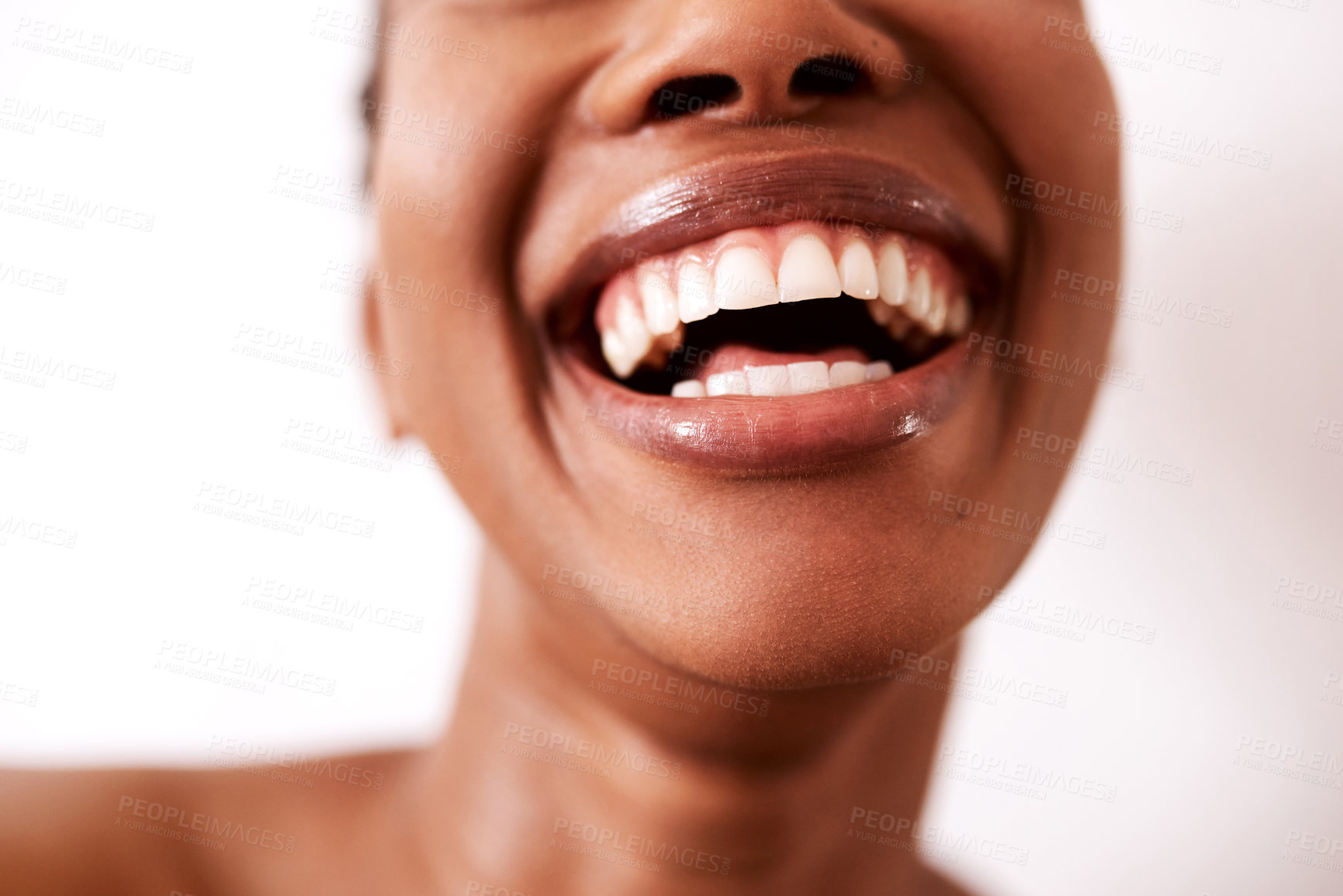 Buy stock photo Studio shot of an unrecognizable woman laughing against a white background