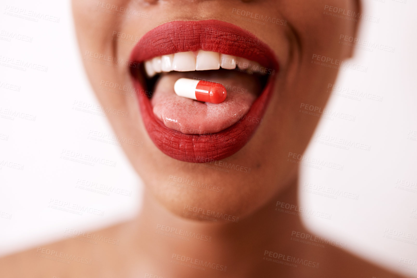 Buy stock photo Cropped shot of a young women posing in studio