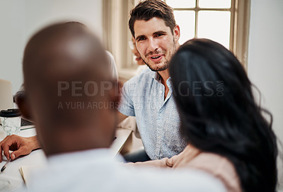 Buy stock photo Shot of a group of businesspeople having a meeting in a modern office