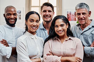 Buy stock photo Portrait of a group of confident businesspeople working in a modern office