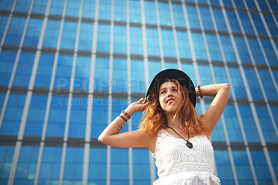 Buy stock photo Thinking, building and woman with urban fashion, confidence and smile on outdoor travel. Weekend, relax and happy gen z girl with unique style, identity and morning adventure in city with low angle