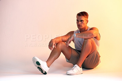 Buy stock photo Man, fitness and thinking on floor, studio and reflection with mock up space for decision by background. Person, athlete and rest with fatigue, perspective and break for workout, exercise or training