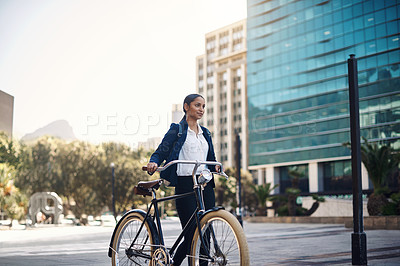 Buy stock photo Transport, walking and businesswoman with a bicycle in the city, morning and street for work routine. Eco friendly, travel and professional female employee commuting to office with bike in urban town