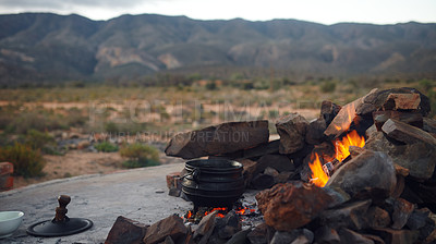 Buy stock photo Mountain, camping and pot of food on fire, charcoal and rocks for grill, bbq and cooking outdoors in nature. Travel, barbecue and meal for nutrition for journey, adventure and survival at campfire