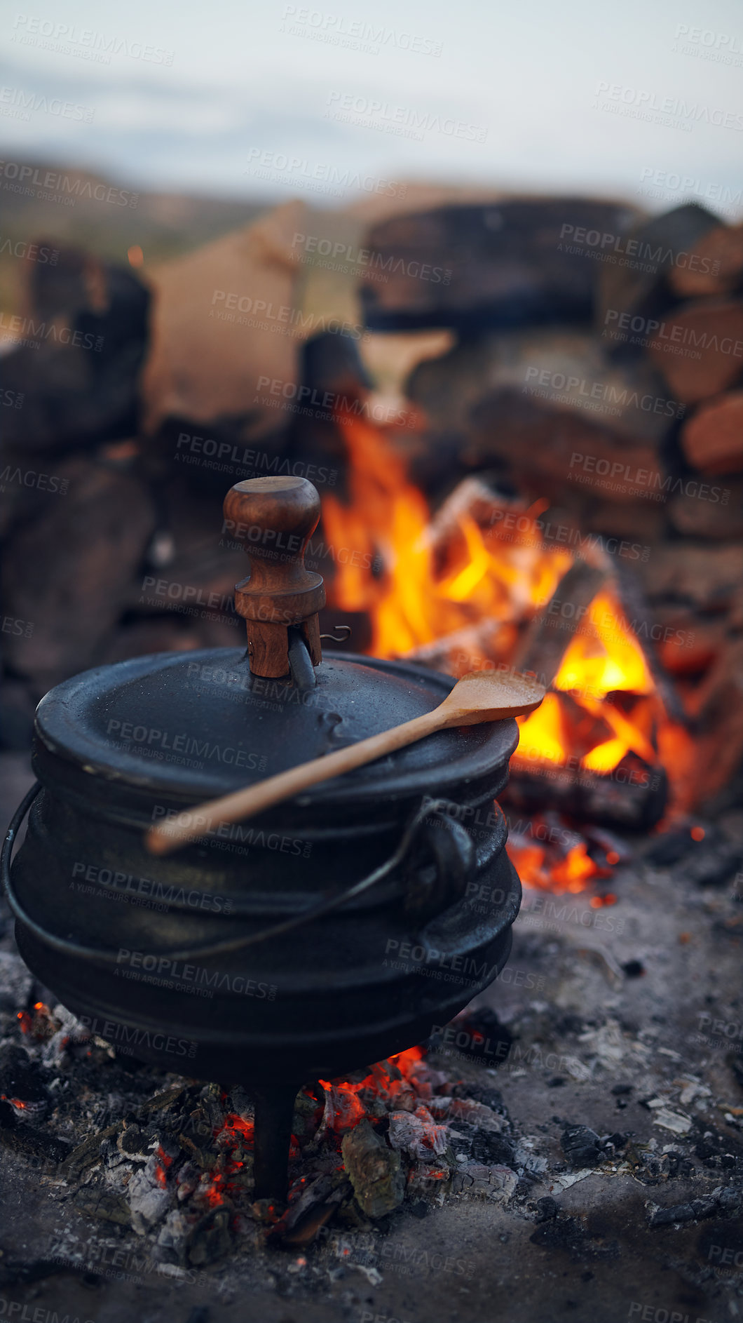Buy stock photo Shot of a traditional South African food being cooked by campfire outdoors